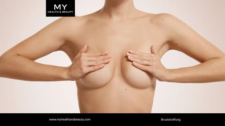 Bare female torso with hands covering breasts, illustrating breast lift procedures (Bruststraffung).